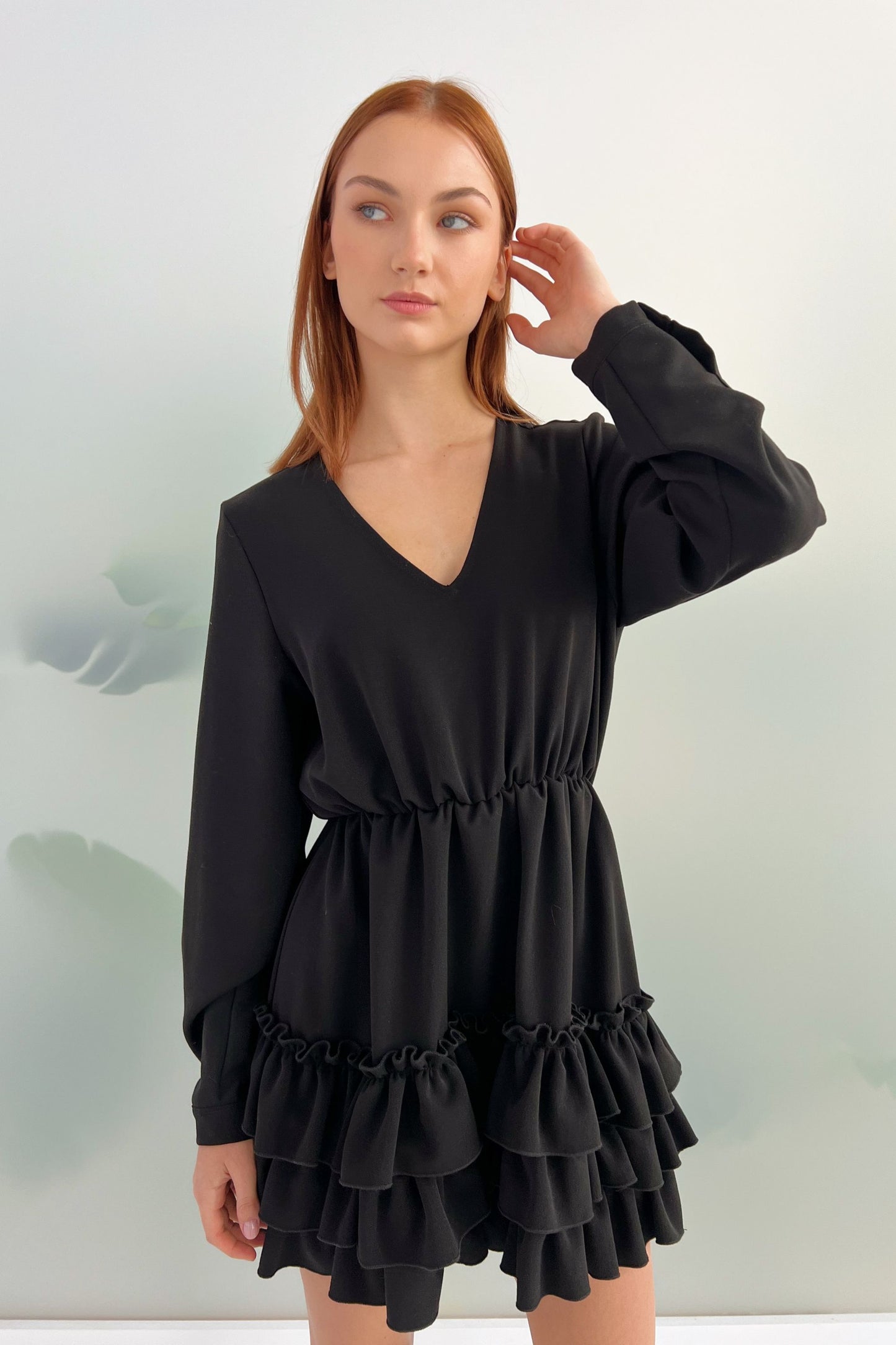 Black autumn dress with ruffles