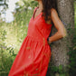 Coral midi length summer dress with ruffles