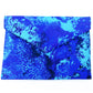 Rokassomiņa ar abstraktu zili lillā apdruku