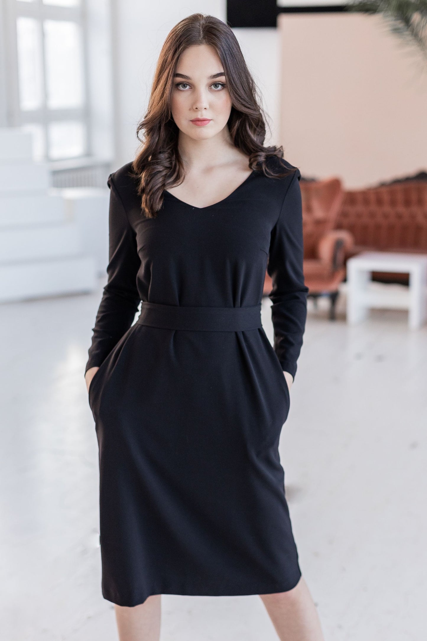 Black classic, loose-fitting dress with a belt