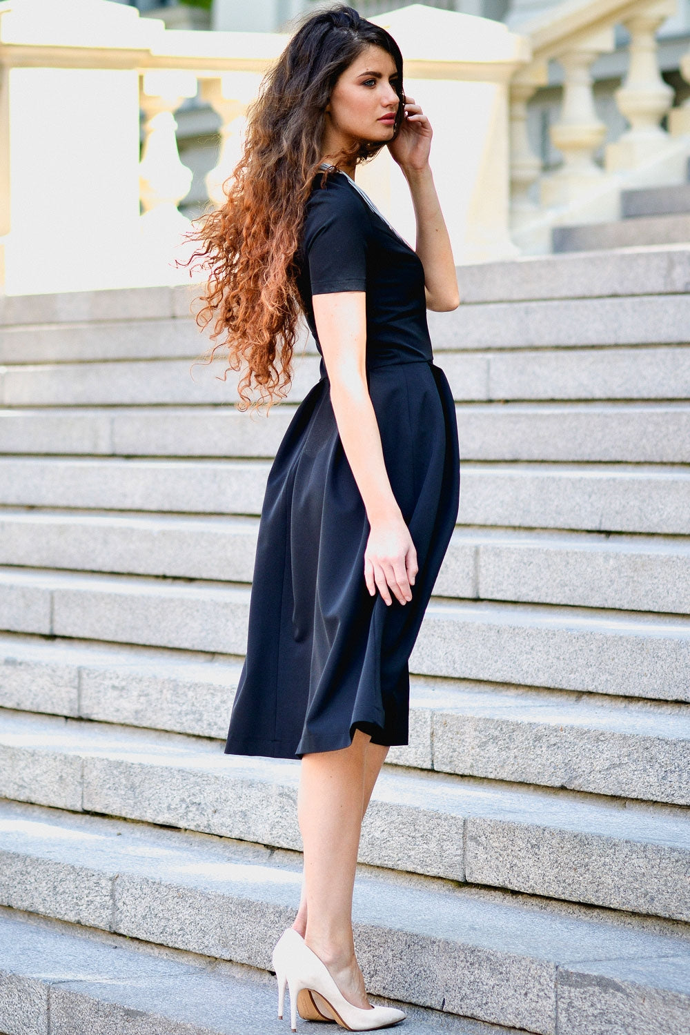 Black dress with pleats in skirt part