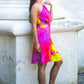 Bright artificial silk dress with abstract print