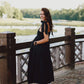Black cotton dress with bows