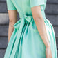 Mint dress with pleats