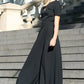 Black maxi dress with circle skirts and belt