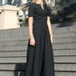 Black maxi dress with circle skirts and belt
