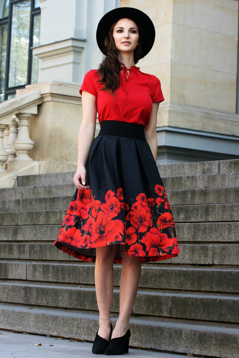 Black full skirts with painted poppies print