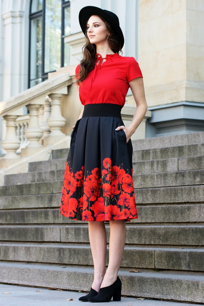 Black full skirts with painted poppies print