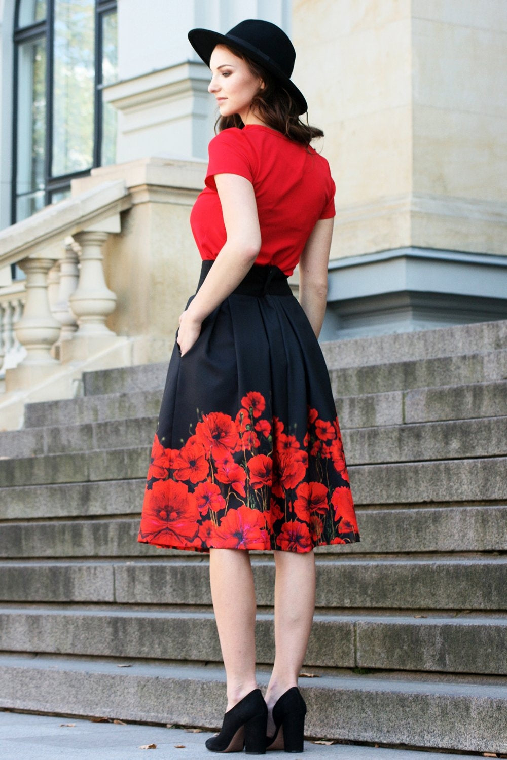 Black full skirts with painted poppies print