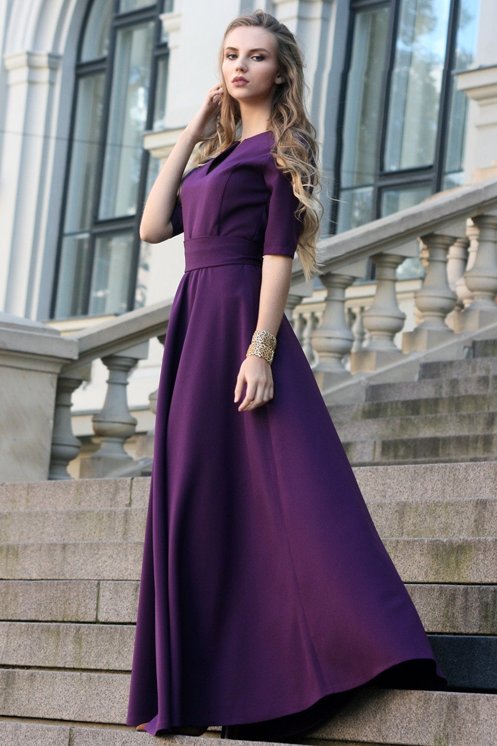 Dark purple maxi dress with circle skirts. Golden color detail in neck GUNTINA Dark purple maxi dress with circle skirts. Golden color detail in neck GUNTINA
