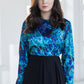 Blouse with a collar with abstract blue flowers
