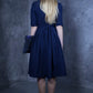 Dark blue dress with pleats