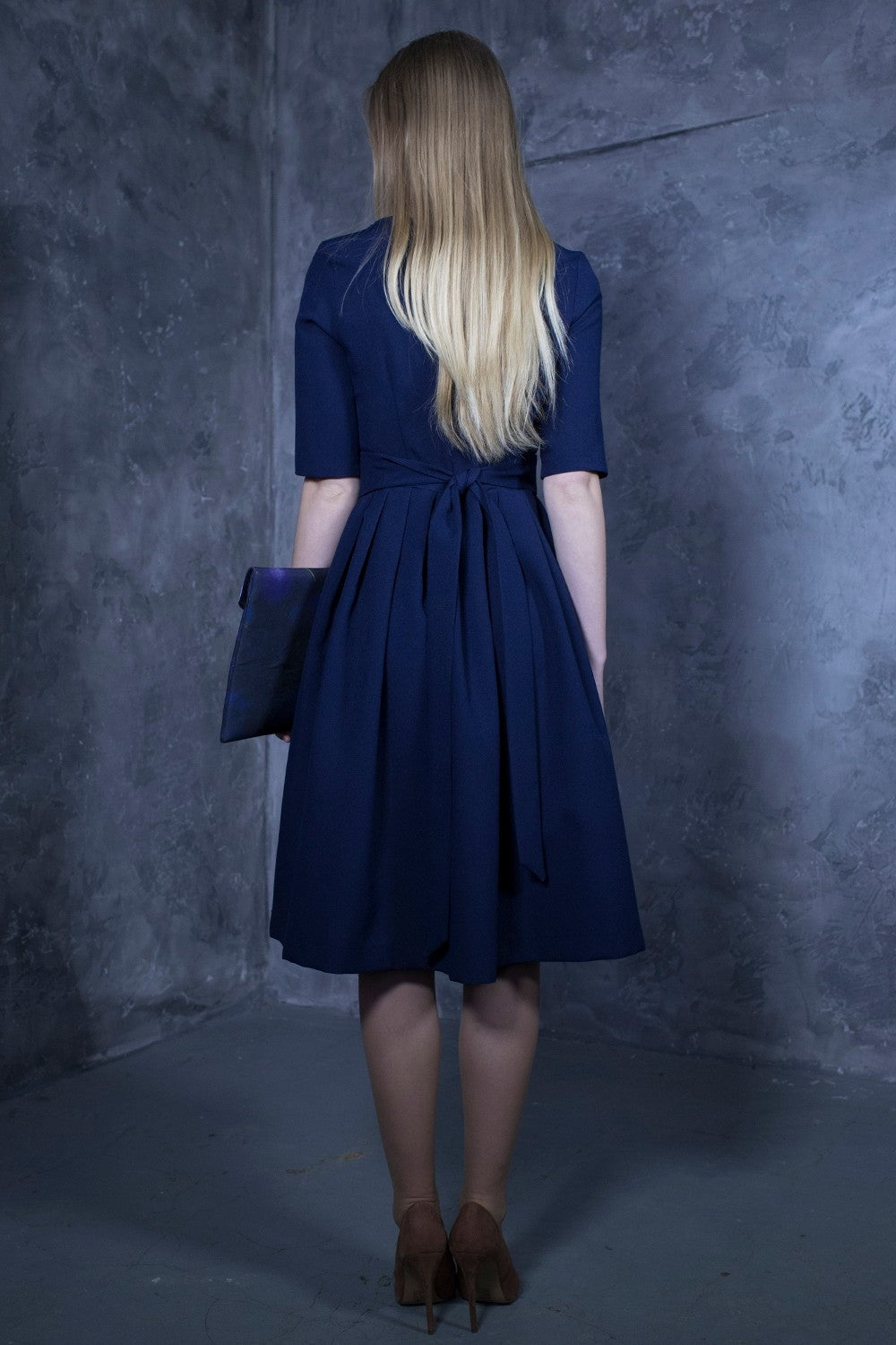 Dark blue dress with pleats