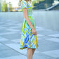 Dress with abstract blue-yellow line print