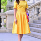 Dzeltena kleita ar ielocēm