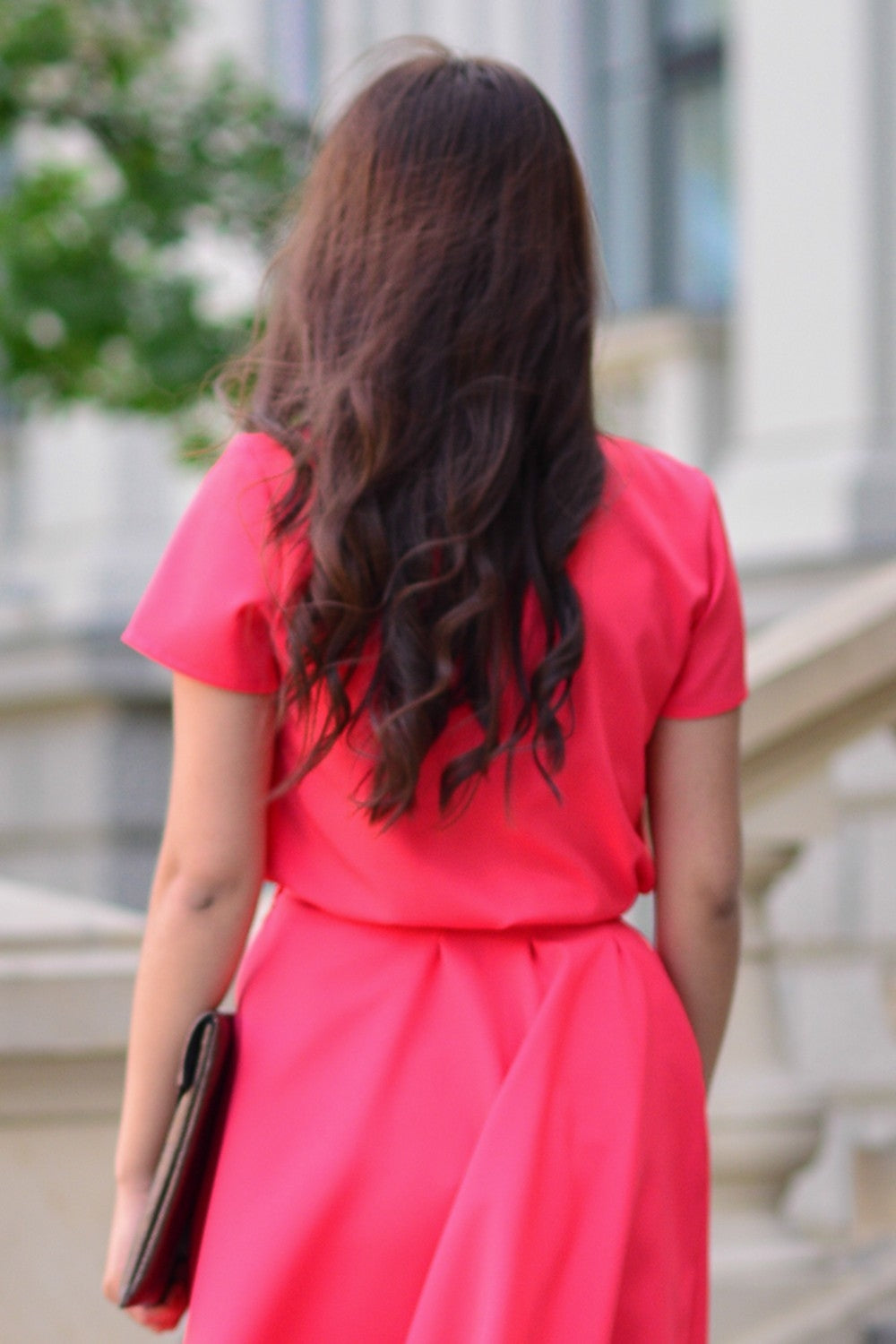 Coral blouse with ribbon in front