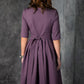 Pelēka violeta kleita ar ielocēm